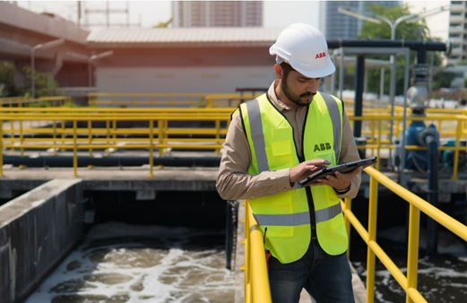 variable speed drive training, this image shows an ABB engineer at a wastewater site